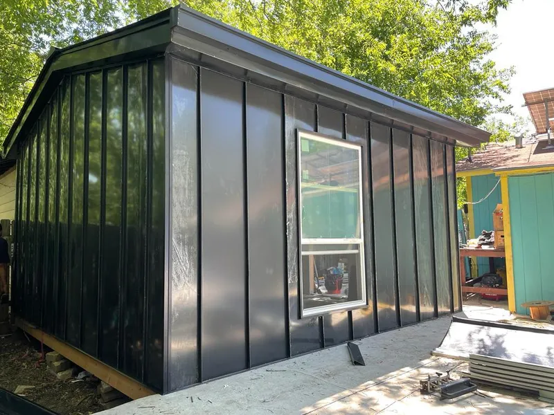 Black standing seam metal wall panels for Roof Inspection in Peninsula